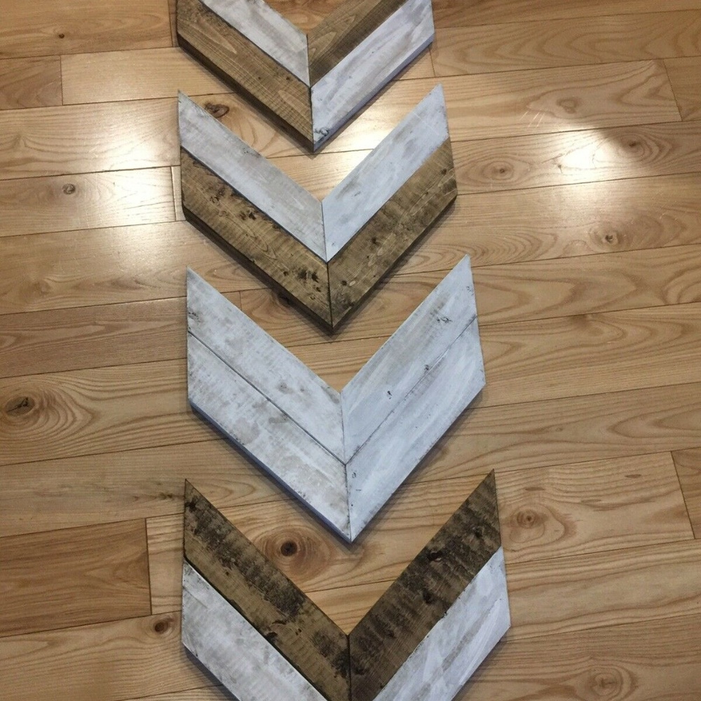4 wall decor arrows brown and white.